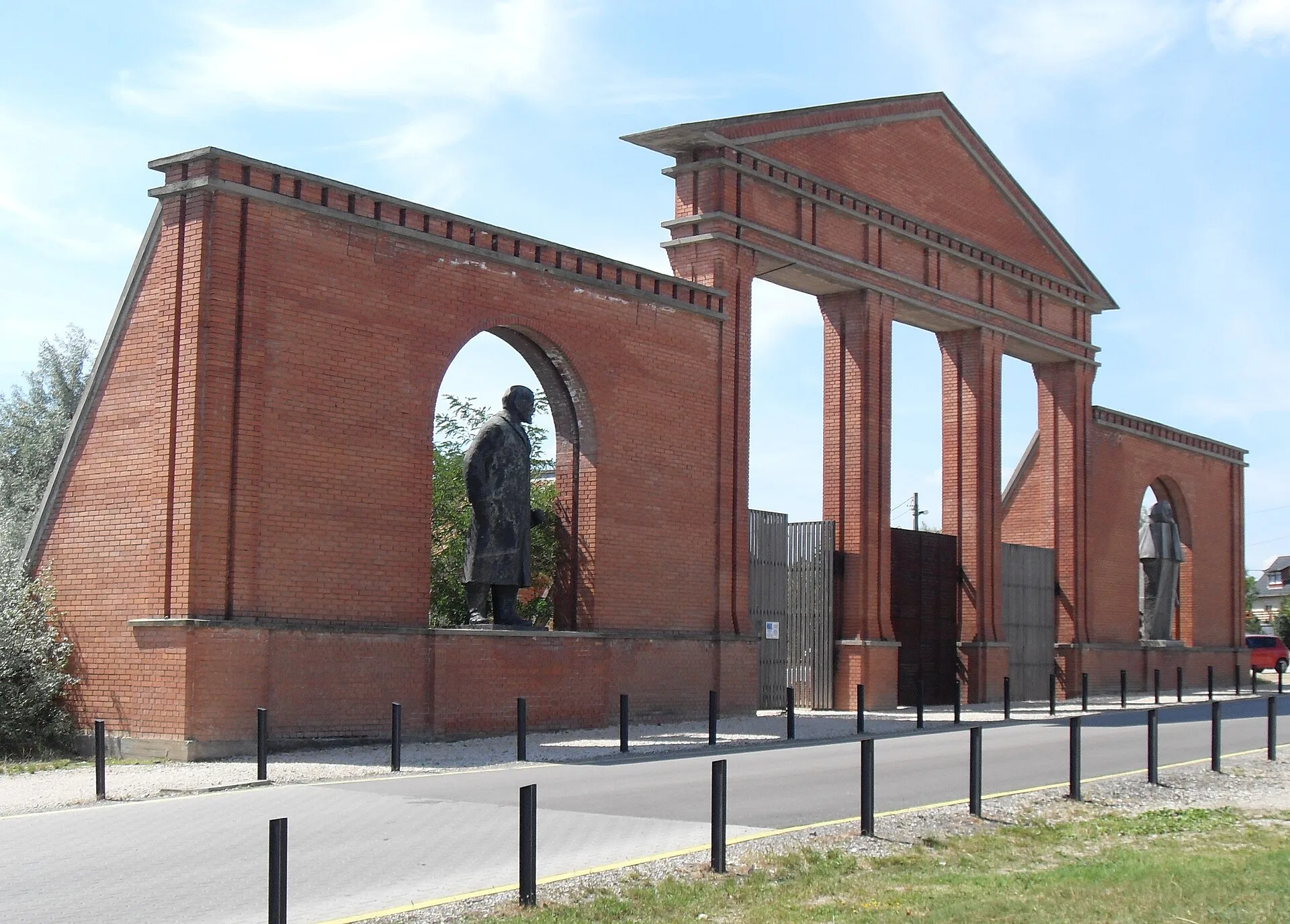 Main entrance of the Memento Park with Lenin, Marx and Engels Untitled