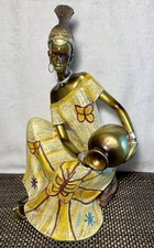 Listing image for Heritage By Jay African Woman Figurine Yellow Gold Resin Decor Sculpture
