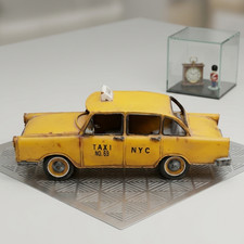 Listing image for Vintage Metal NYC Yellow Cab Toy - Antique New York City Taxi No. 69 Collectible